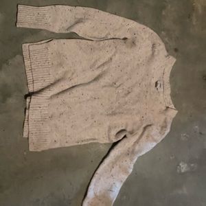 It’s a sweet sweater, slits on the side that go mid-rib